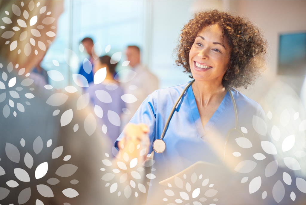 A friendly nurse reaching out her hand to shake a patient's hand